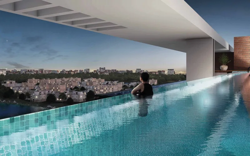 Purva Meraki: Rooftop infinity pool at dusk